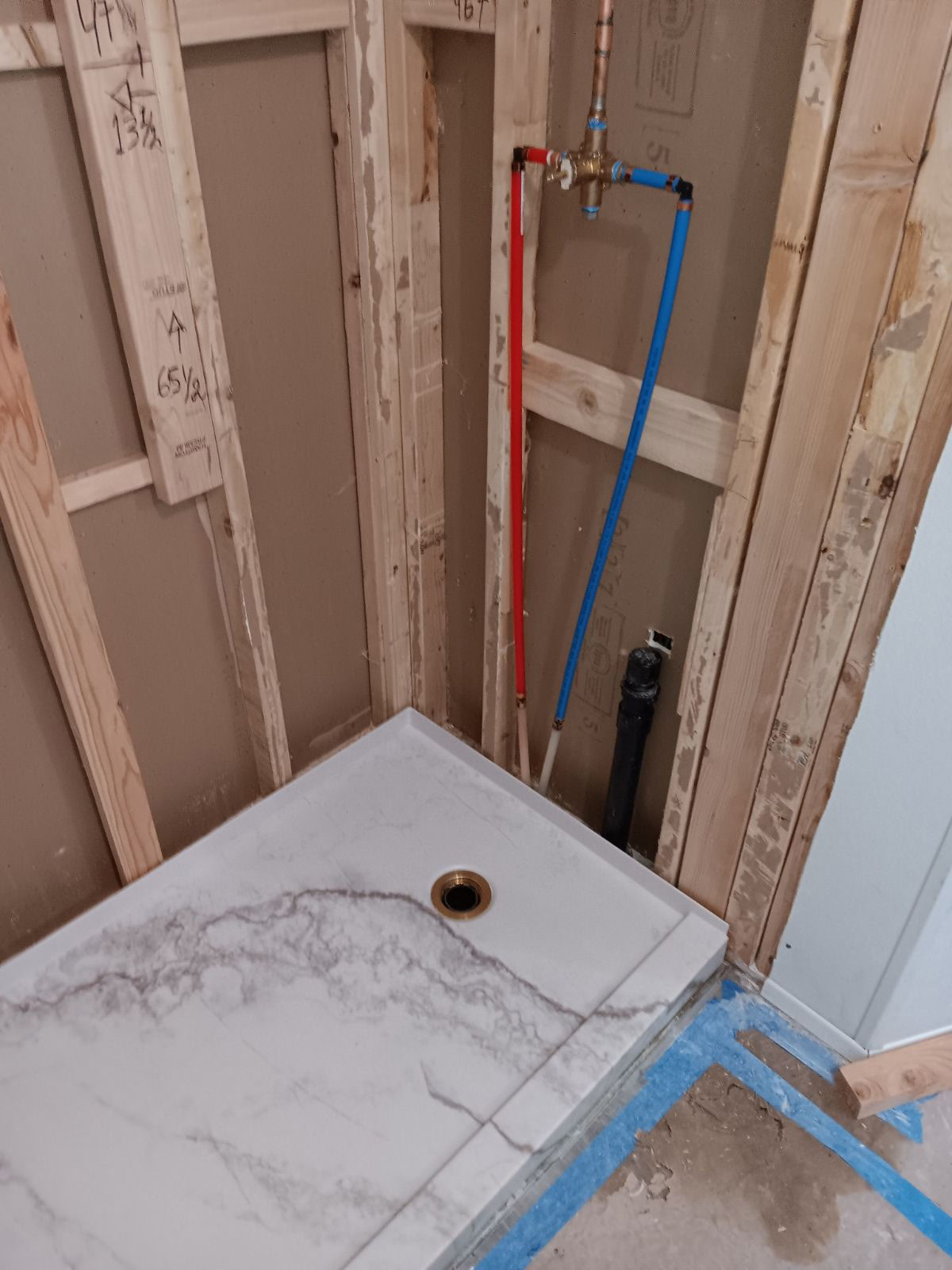 Shower pan and valve replacement mid-install