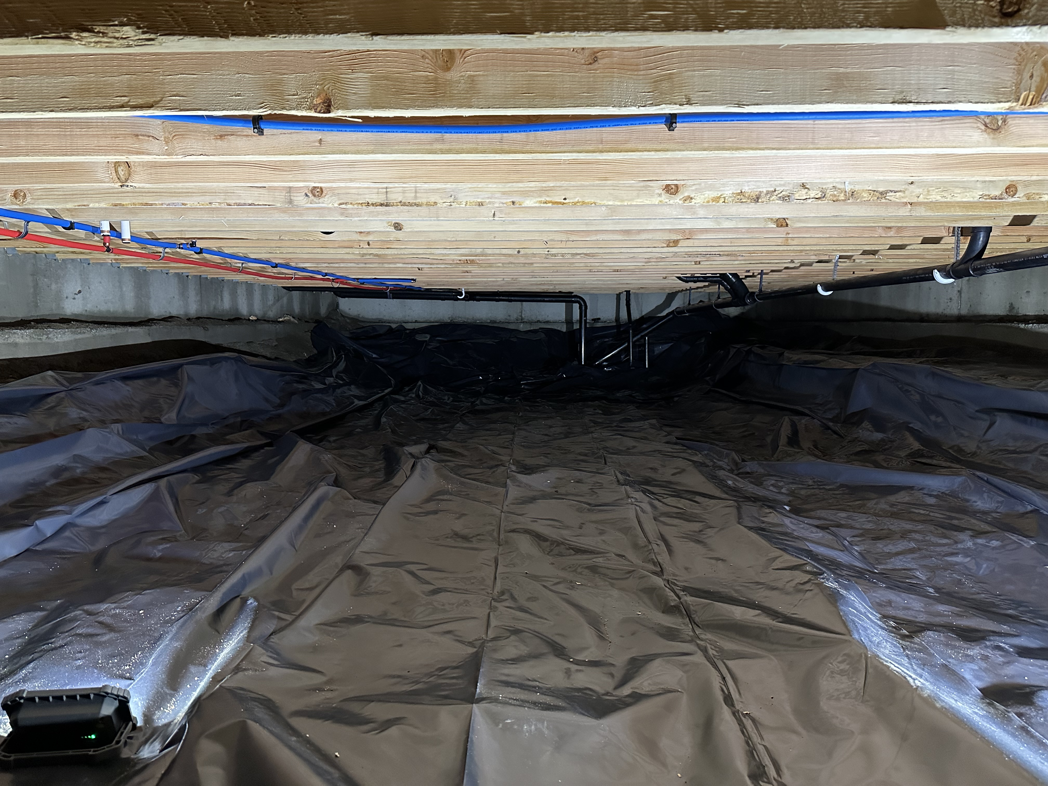 Finished crawlspace plumbing with insulated lines